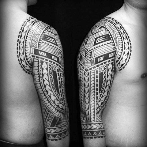 male-with-polynesian-arm-traditional-tribal-tattoo